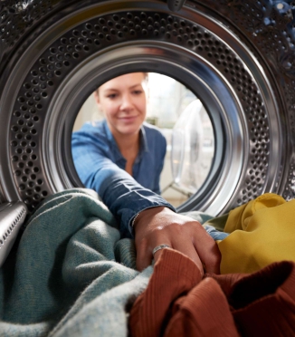 Why wash bedding inside out?